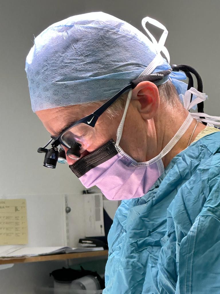 Professor David Warwick operating, 2022